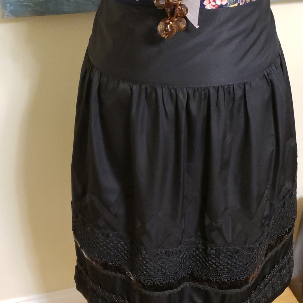Black skirt embellished